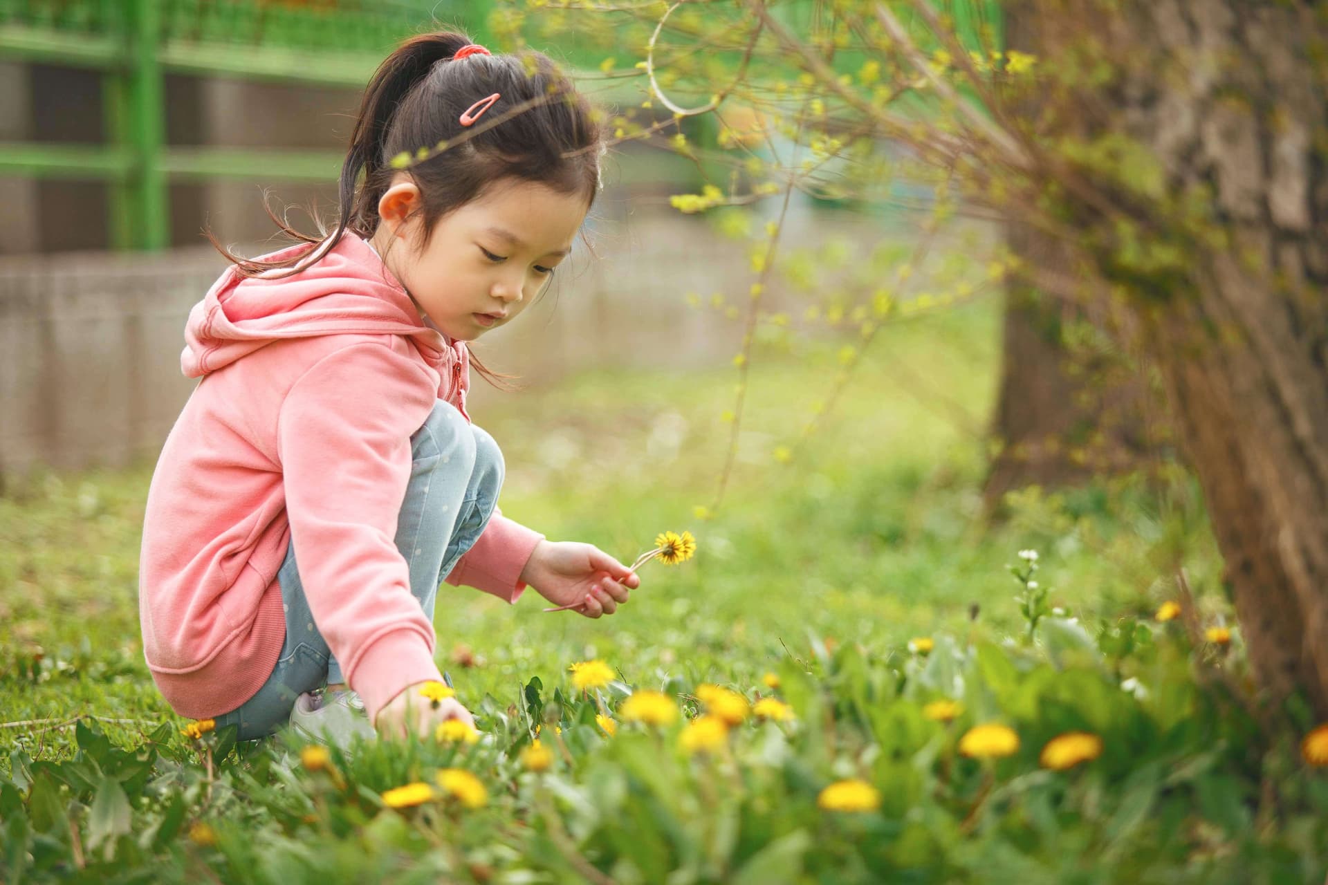 Child experiencing outdoor allergies in a field